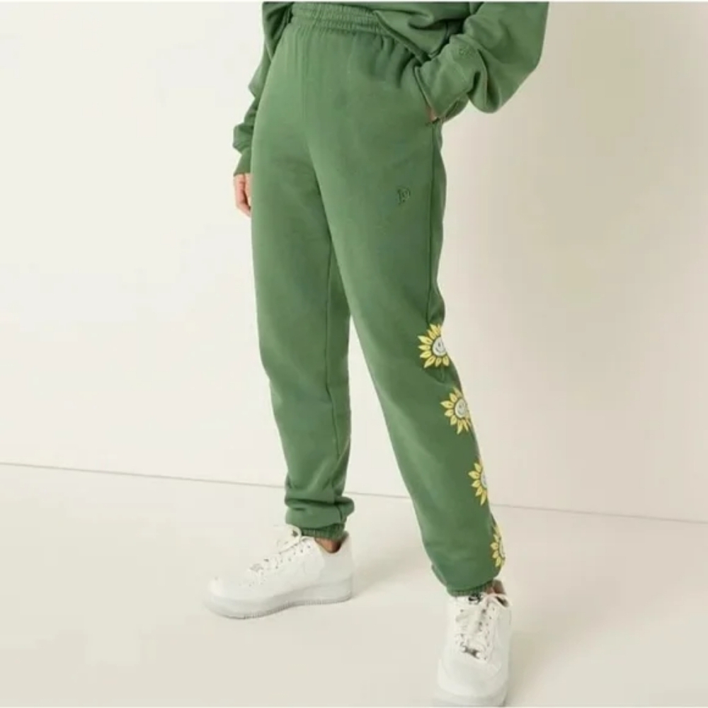Green Sweatshirt with Sunflower Smiley Design